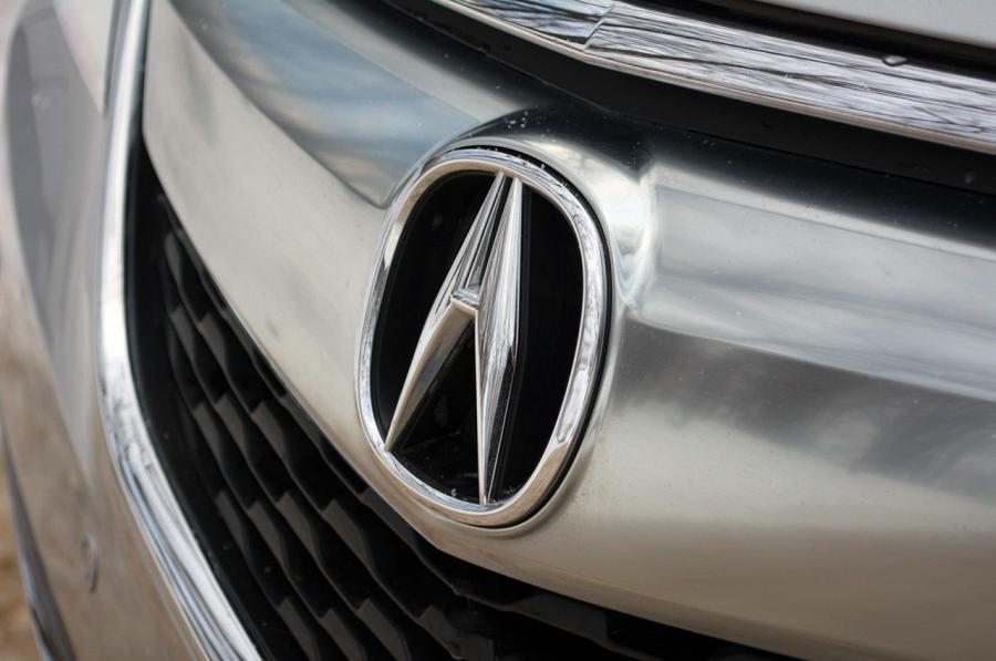 Логотип Acura MDX SH-AWD (YD3) 2014 года  (фото 8 из 36)
